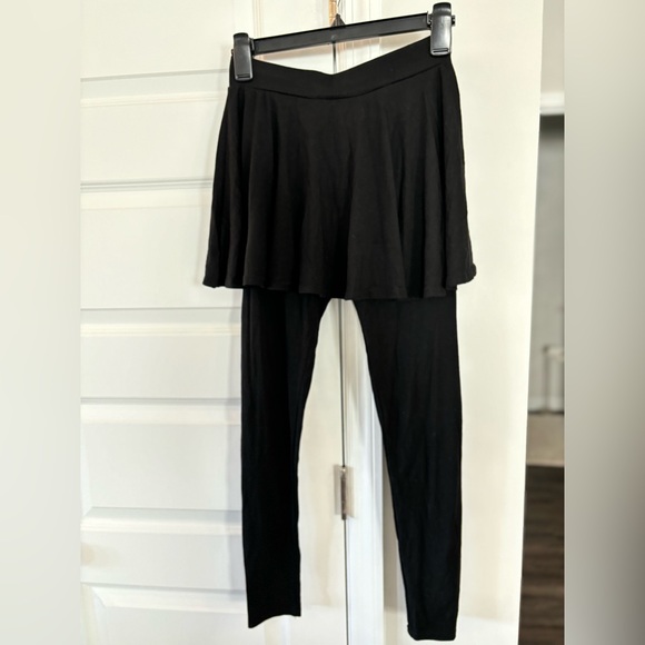 Small black cotton leggings with a skirt built over them. Never worn. - Picture 2 of 3